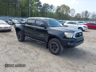 2014 Toyota Tacoma PreRunner with VIN 5TFJU4GN7EX061460, listed as a IAAI auction lot 41947252 with 135,543 mi miles and . Bid and sale history available at DreamBid. Image 1.