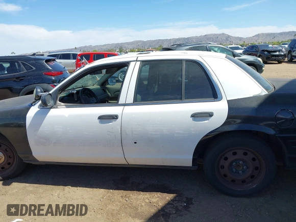 2009 Ford Police Interceptor z VIN 2FAHP71V59X125047, wystawiony jako IAAI lot #42081124 z przebiegiem Nie podano mil oraz . Historia ofert i sprzedaży dostępna na DreamBid. Obrazek 13.