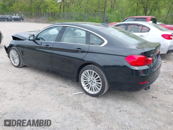 2016 BMW 4 Series 428i xDrive z VIN WBA4C9C51GG139038, wystawiony jako IAAI lot #42247629 z przebiegiem 48 388 mil mil oraz . Historia ofert i sprzedaży dostępna na DreamBid. Obrazek 3.