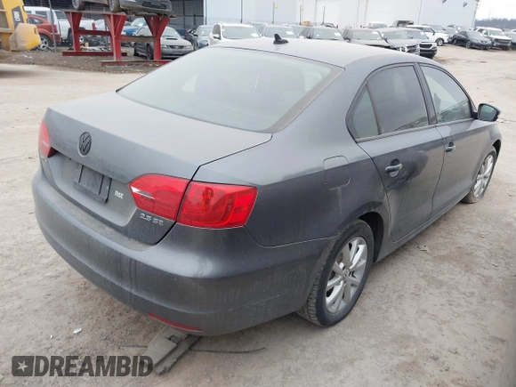 2011 Volkswagen Jetta Sedan SE w/Convenience & Sunroof with VIN 3VWDX7AJ8BM306437, listed as a IAAI auction lot 41714664 with 234,948 mi miles. Bid and sale history available at carsss.com. Image 4.