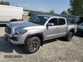 2019 Toyota Tacoma SR z VIN 3TMCZ5AN2KM232934, wystawiony jako Copart lot #53867155 z przebiegiem 86 488 mil mil oraz Szkoda całkowita • Salvage title. Historia ofert i sprzedaży dostępna na DreamBid. Obrazek 1.