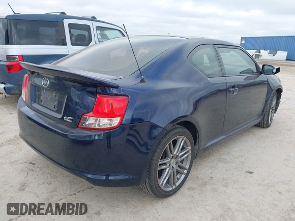 2012 Scion tC with VIN JTKJF5C77C3032626, listed as a IAAI auction lot 41774978 with 177,962 mi miles. Bid and sale history available at carsss.com. Image 4.
