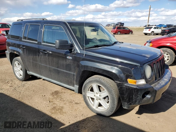 2010 Jeep Patriot Sport with VIN 1J4NF2GB8AD519311, listed as a Copart auction lot 53799085 with 203,762 mi miles and Salvage Title. Bid and sale history available at carsss.com. Image 4.