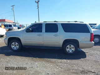 2014 Chevrolet Suburban LT with VIN 1GNSCJE07ER120130, listed as a IAAI auction lot 41792310 with 238,313 mi miles. Bid and sale history available at carsss.com. Image 14.