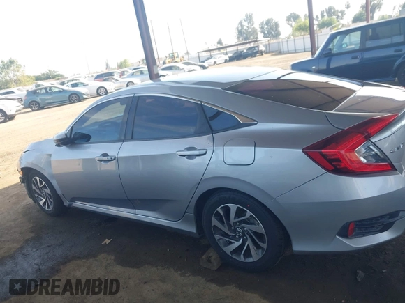 2016 Honda Civic EX with VIN 19XFC2F73GE239657, listed as a IAAI auction lot 42085960 with 136,207 mi miles and . Bid and sale history available at DreamBid. Image 14.