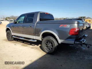 2003 Ford F-150 XLT with VIN 1FTRW08L43KD52642, listed as a Copart auction lot 46829485 with 206,718 mi miles and Salvage Title. Bid and sale history available at carsss.com. Image 2.