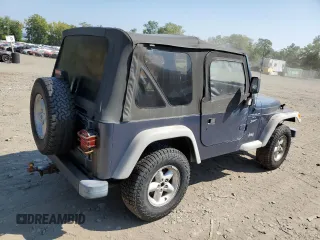 2001 Jeep Wrangler Sport with VIN 1J4FA49S41P352844, listed as a Copart auction lot 69216924 with 160,129 mi miles and Clean Title. Bid and sale history available at carsss.com. Image 3.