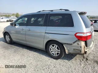 2006 Honda Odyssey EX-L z VIN 5FNRL38756B087695, wystawiony jako Copart lot #60122525 z przebiegiem 213 221 mil mil oraz Szkoda całkowita • Salvage title. Historia ofert i sprzedaży dostępna na DreamBid. Obrazek 2.