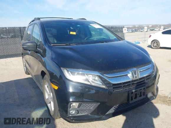 2018 Honda Odyssey EX-L z VIN 5FNRL6H74JB031306, wystawiony jako IAAI lot #41603478 z przebiegiem Nie podano mil oraz . Historia ofert i sprzedaży dostępna na DreamBid. Obrazek 1.
