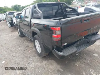 2024 Nissan Frontier SV with VIN 1N6ED1EK2RN627094, listed as a IAAI auction lot 42308056 with 5,692 mi miles and . Bid and sale history available at DreamBid. Image 3.
