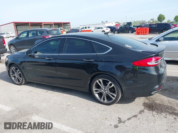 2017 Ford Fusion Titanium with VIN 3FA6P0K91HR257462, listed as a IAAI auction lot 42079361 with 124,914 mi miles and . Bid and sale history available at DreamBid. Image 14.