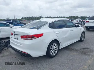 2018 Kia Optima LX with VIN 5XXGT4L34JG253597, listed as a IAAI auction lot 41915762 with 166,521 mi miles. Bid and sale history available at carsss.com. Image 4.