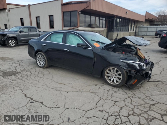 2014 Cadillac CTS Luxury AWD with VIN 1G6AX5S35E0184477, listed as a Copart auction lot 51186245 with Not provided miles and Salvage title. Bid and sale history available at DreamBid. Image 4.