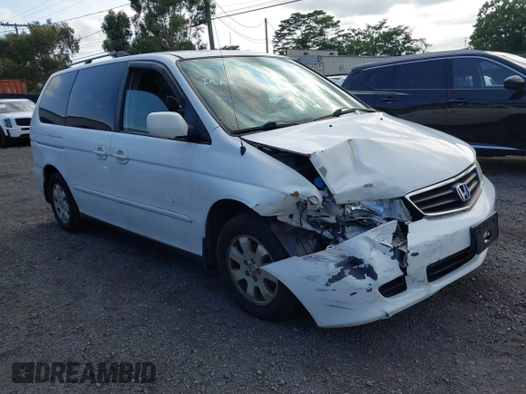 2004 Honda Odyssey EX-L with VIN 5FNRL18924B064040, listed as a IAAI auction lot 41350306 with 130,803 mi miles and . Bid and sale history available at DreamBid. Image 1.