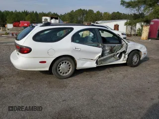 1999 Ford Taurus SE z VIN 1FAFP58S0XA272714, wystawiony jako Copart lot #48966215 z przebiegiem 255 885 mil mil oraz Szkoda całkowita • Salvage title. Historia ofert i sprzedaży dostępna na DreamBid. Obrazek 3.