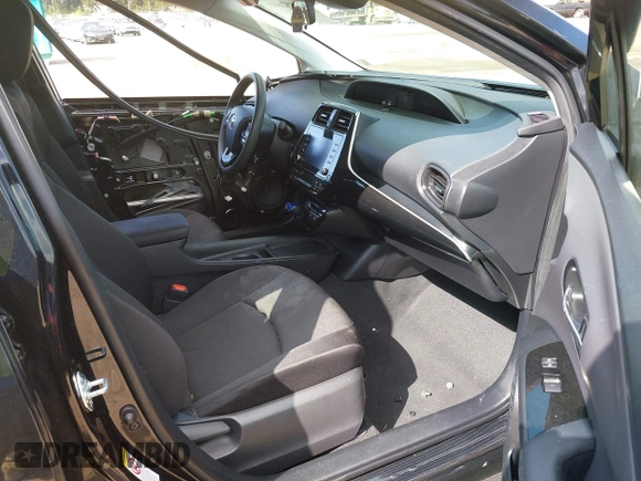 2021 Toyota Prius L Eco with VIN JTDKAMFU3M3140233, listed as a IAAI auction lot 42182685 with 38,842 mi miles and . Bid and sale history available at DreamBid. Image 5.
