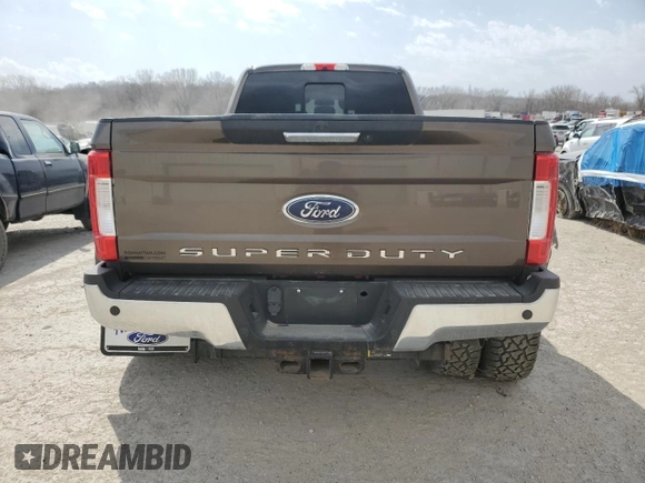 2017 Ford F-350 Lariat with VIN 1FT8W3DT7HED26111, listed as a Copart auction lot 48925405 with 147,787 mi miles and Salvage title. Bid and sale history available at DreamBid. Image 6.