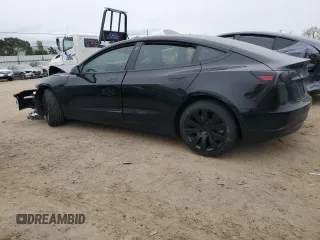 2021 Tesla Model 3 Standard Range Plus with VIN 5YJ3E1EA6MF877752, listed as a Copart auction lot 44776425 with Not Provided miles and Salvage Title. Bid and sale history available at DreamBid. Image 2.