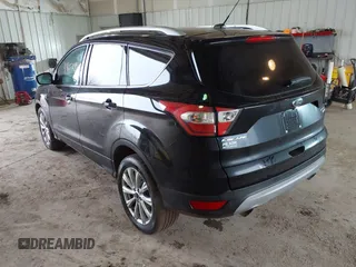 2017 Ford Escape Titanium with VIN 1FMCU0JD2HUE71179, listed as a IAAI auction lot 41465849 with 95,426 mi miles. Bid and sale history available at carsss.com. Image 3.