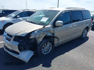 2013 Dodge Grand Caravan SXT with VIN 2C4RDGCGXDR635008, listed as a IAAI auction lot 41859146 with 133,119 mi miles and . Bid and sale history available at DreamBid. Image 2.