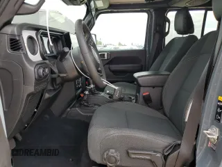 2024 Jeep Wrangler Sport S with VIN 1C4PJXDN4RW124924, listed as a Copart auction lot 50516555 with 7,747 mi miles and Salvage Title. Bid and sale history available at DreamBid. Image 7.