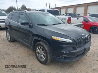 2014 Jeep Cherokee Latitude with VIN 1C4PJLCBXEW172745, listed as a IAAI auction lot 41718415 with 115,777 mi miles. Bid and sale history available at carsss.com. Image 1.