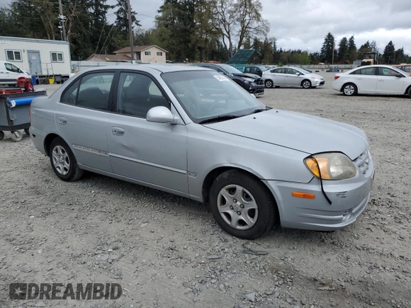 2005 Hyundai Accent GLS z VIN KMHCG45C75U639281, wystawiony jako Copart lot #54887095 z przebiegiem 136 090 mil mil oraz Szkoda całkowita • Salvage title. Historia ofert i sprzedaży dostępna na DreamBid. Obrazek 4.