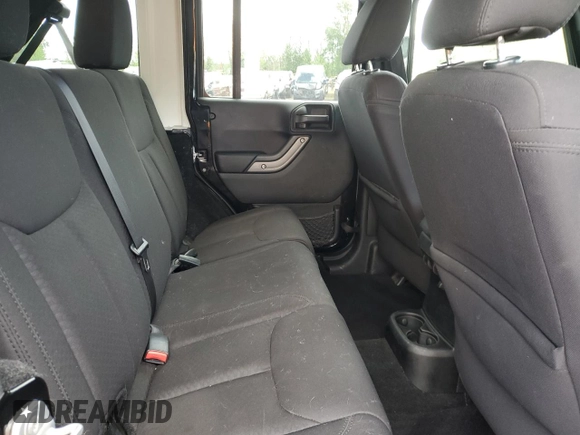 2013 Jeep Wrangler Unlimited Sport z VIN 1C4HJWDG2DL698061, wystawiony jako Copart lot #57823945 z przebiegiem 144 558 mil mil oraz Czysty tytuł • Clean title. Historia ofert i sprzedaży dostępna na DreamBid. Obrazek 11.