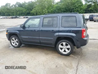 2014 Jeep Patriot Latitude with VIN 1C4NJRFB0ED649779, listed as a Copart auction lot 60444435 with 161,009 mi miles and Salvage title. Bid and sale history available at DreamBid. Image 2.