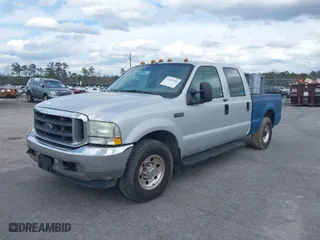 2004 Ford Super Duty F-250 XL with VIN 1FTNW20L74EA70355, listed as a IAAI auction lot 41303705 with 237,456 mi miles. Bid and sale history available at carsss.com. Image 2.