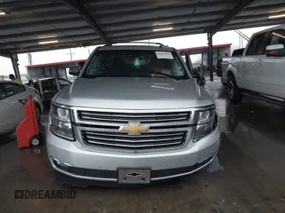 2015 Chevrolet Tahoe LTZ with VIN 1GNSCCKC5FR123099, listed as a IAAI auction lot 41391974 with Not provided miles and . Bid and sale history available at DreamBid. Image 12.