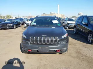 2014 Jeep Cherokee Trailhawk with VIN 1C4PJMBS5EW280598, listed as a IAAI auction lot 42079597 with 171,564 mi miles. Bid and sale history available at carsss.com. Image 12.
