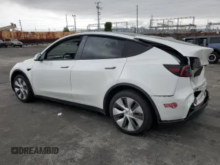 2021 Tesla Model Y Long Range with VIN 5YJYGDEEXMF151686, listed as a Copart auction lot 53903115 with 65,321 mi miles and Salvage Title. Bid and sale history available at DreamBid. Image 2.