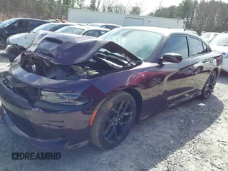 2021 Dodge Charger GT with VIN 2C3CDXHG4MH667025, listed as a IAAI auction lot 41602696 with 77,503 mi miles and . Bid and sale history available at DreamBid. Image 2.
