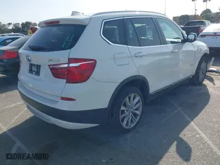 2011 BMW X3 28i with VIN 5UXWX5C52BL715405, listed as a IAAI auction lot 41915177 with 142,199 mi miles. Bid and sale history available at carsss.com. Image 4.