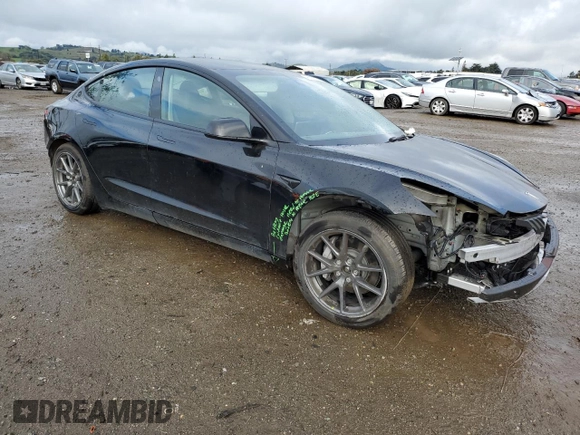 2022 Tesla Model 3 Long Range with VIN 5YJ3E1EB2NF313672, listed as a Copart auction lot 48896025 with 19,936 mi miles and Salvage Title. Bid and sale history available at DreamBid. Image 4.
