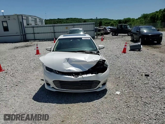 2014 Toyota Avalon Limited z VIN 4T1BK1EB4EU089540, wystawiony jako Copart lot #56886765 z przebiegiem 88 278 mil mil oraz Szkoda całkowita • Salvage title. Historia ofert i sprzedaży dostępna na DreamBid. Obrazek 13.