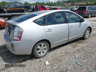 2008 Toyota Prius with VIN JTDKB20UX83434955, listed as a IAAI auction lot 42193526 with 198,791 mi miles. Bid and sale history available at carsss.com. Image 4.