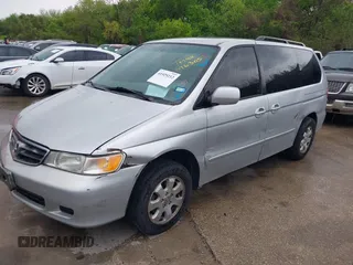 2004 Honda Odyssey EX with VIN 5FNRL18694B076305, listed as a IAAI auction lot 41929212 with 287,717 mi miles and . Bid and sale history available at DreamBid. Image 2.