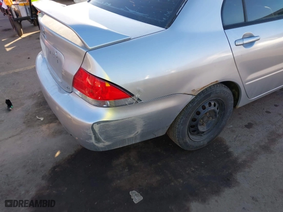 2004 Mitsubishi Lancer ES with VIN JA3AJ26E44U037047, listed as a IAAI auction lot 41545446 with 176,895 mi miles. Bid and sale history available at carsss.com. Image 6.