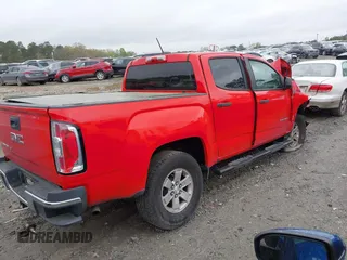 2019 GMC Canyon 2WD z VIN 1GTG5BEN7K1239140, wystawiony jako IAAI lot #41897376 z przebiegiem 152 035 mil mil oraz . Historia ofert i sprzedaży dostępna na DreamBid. Obrazek 4.