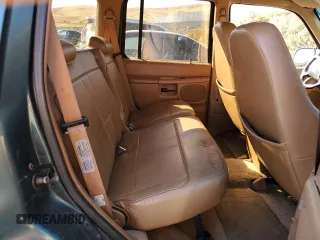 1996 Ford Explorer XL z VIN 1FMDU34X4TZA70403, wystawiony jako Copart lot #76780834 z przebiegiem 131 020 mil mil oraz Tytuł czysty. Historia ofert i sprzedaży dostępna na DreamBid. Obrazek 10.
