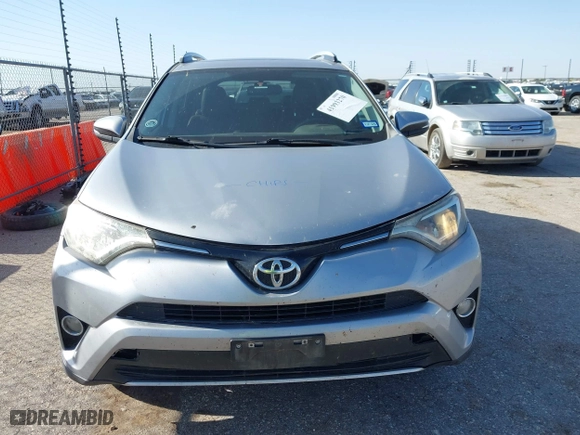 2016 Toyota RAV4 XLE with VIN 2T3WFREV1GW310309, listed as a IAAI auction lot 41993270 with 200,289 mi miles. Bid and sale history available at carsss.com. Image 13.