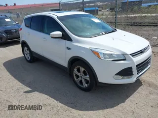 2014 Ford Escape SE with VIN 1FMCU9GXXEUC50365, listed as a IAAI auction lot 41891030 with 70,399 mi miles. Bid and sale history available at carsss.com. Image 1.