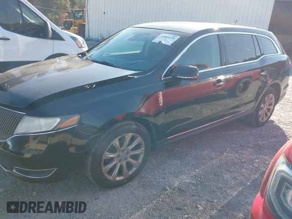 2013 Lincoln MKT with VIN 2LMHJ5FK9DBL56134, listed as a IAAI auction lot 41003176 with 292,292 mi miles and . Bid and sale history available at DreamBid. Image 2.