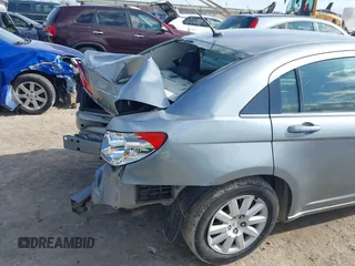 2010 Chrysler Sebring Touring with VIN 1C3CC4FB3AN100865, listed as a IAAI auction lot 42020788 with 182,813 mi miles. Bid and sale history available at carsss.com. Image 6.