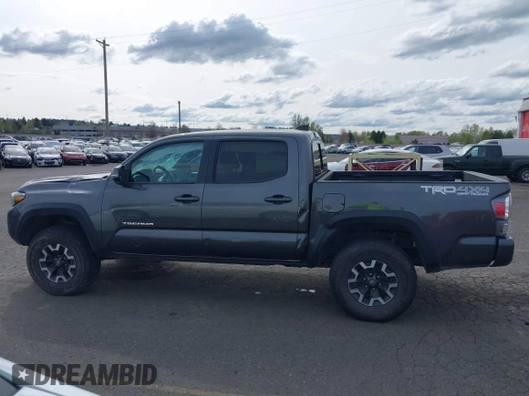 2020 Toyota Tacoma SR5 with VIN 3TMCZ5AN7LM321061, listed as a IAAI auction lot 41985533 with 32,111 mi miles and . Bid and sale history available at DreamBid. Image 15.
