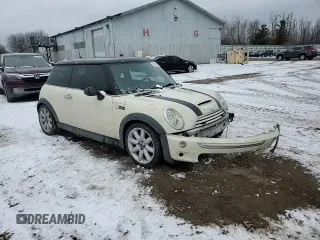 2005 MINI Hardtop S z VIN WMWRE33465TD91749, wystawiony jako Copart lot #43938765 z przebiegiem 166 391 mil mil oraz Szkoda całkowita • Salvage title. Historia ofert i sprzedaży dostępna na DreamBid. Obrazek 11.