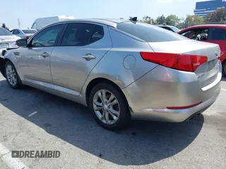 2013 Kia Optima EX z VIN 5XXGN4A70DG148060, wystawiony jako IAAI lot #41900134 z przebiegiem 149 214 mil mil oraz . Historia ofert i sprzedaży dostępna na DreamBid. Obrazek 3.