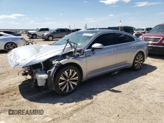 2020 Volkswagen Arteon z VIN WVWDR7AN5LE015434, wystawiony jako Copart lot #60157014 z przebiegiem 67 206 mil mil oraz Szkody całkowita. Historia ofert i sprzedaży dostępna na DreamBid. Obrazek 1.